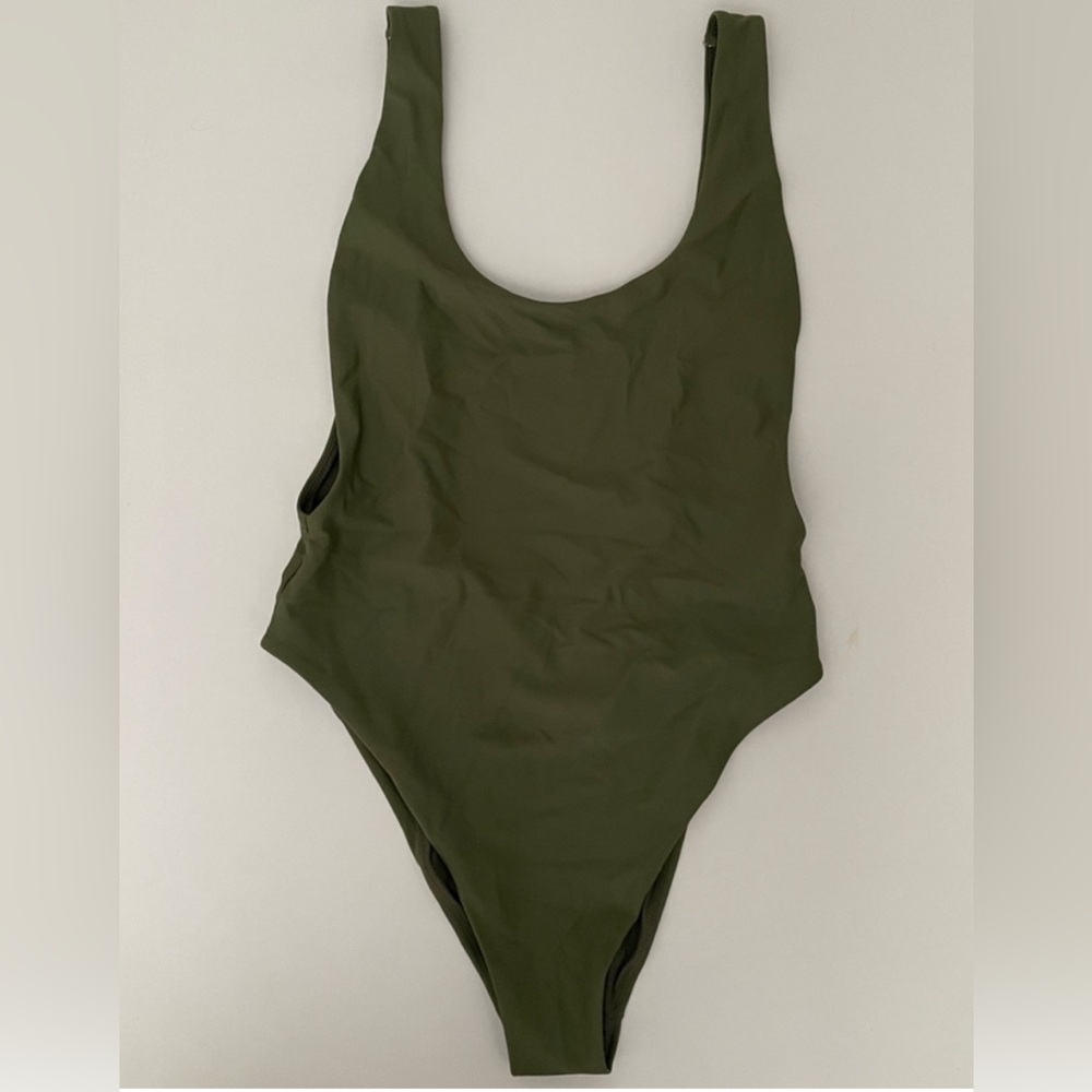 Dark green aerie one piece! New without tags size medium. Low back.